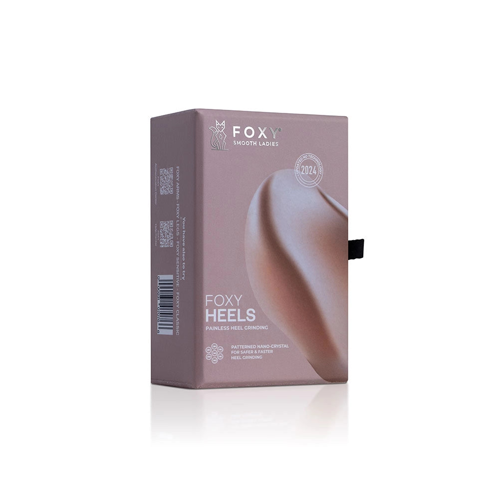 Gold box for FOXY HEELS painless hair removal product, featuring patterned Nano-crystal technology, and 2024 patent date.